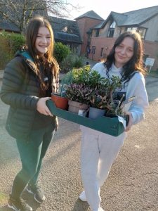 Two Apprentices donating plants to Eden Valley Hospice