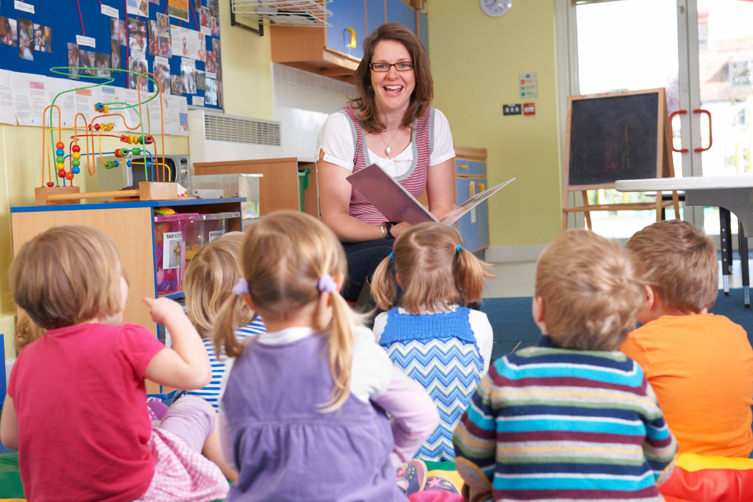 Teacher with students