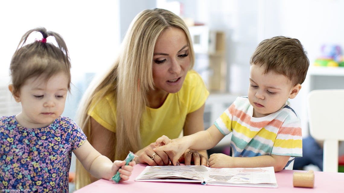 Teacher with student