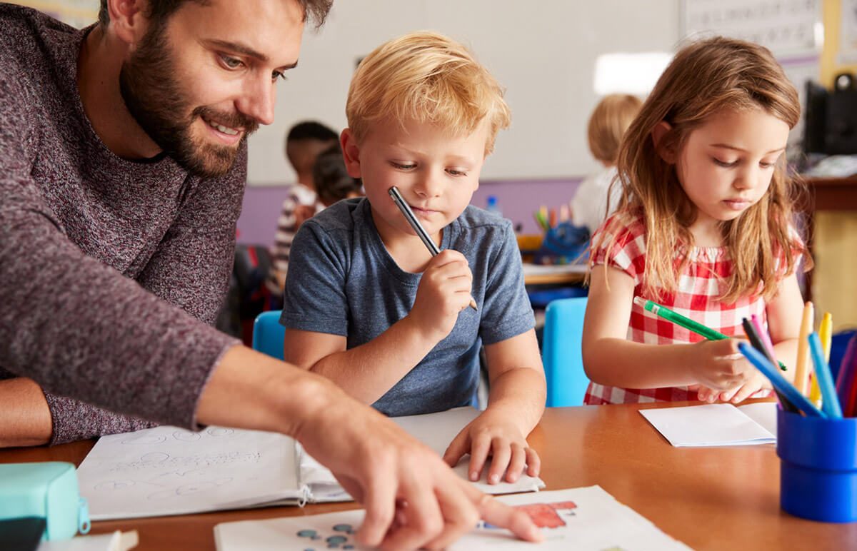 Teacher with student